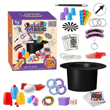 Close-up of magic tricks kit props including dice and cards