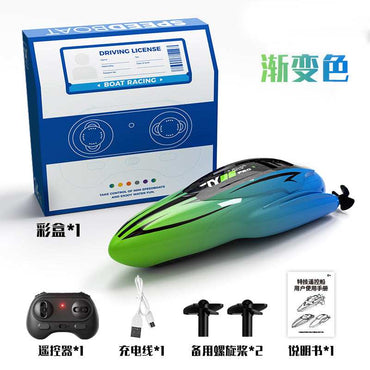 Close-up of RC racing boat hull and remote control
