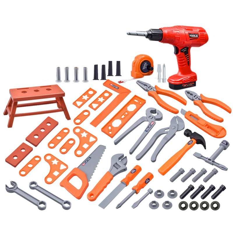 Child playing with toddler tool set and battery-powered drill