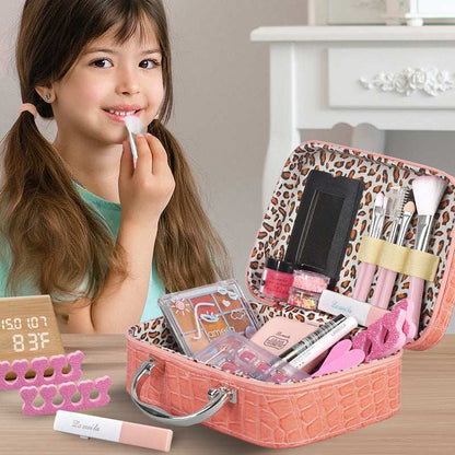 Toddler girl applying washable pretend makeup from the kit