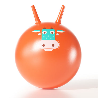 Child jumping and playing on inflatable sensory bounce ball