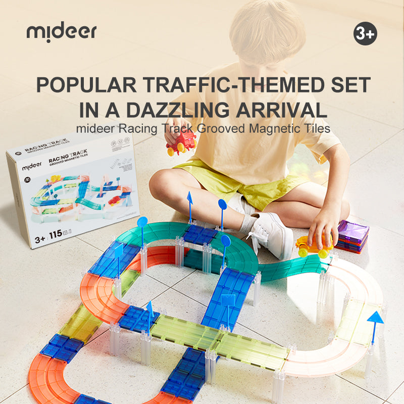 Completed railway track layout with moving train on magnetic tiles