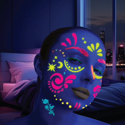 Kids applying colorful temporary tattoo designs with art tools